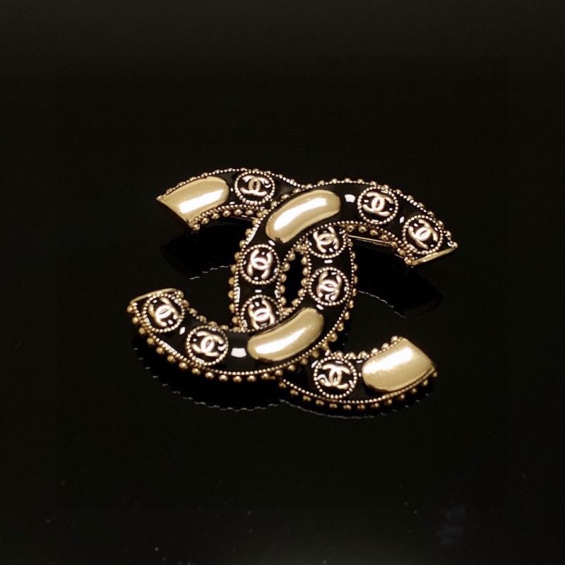 Ch**el brooches